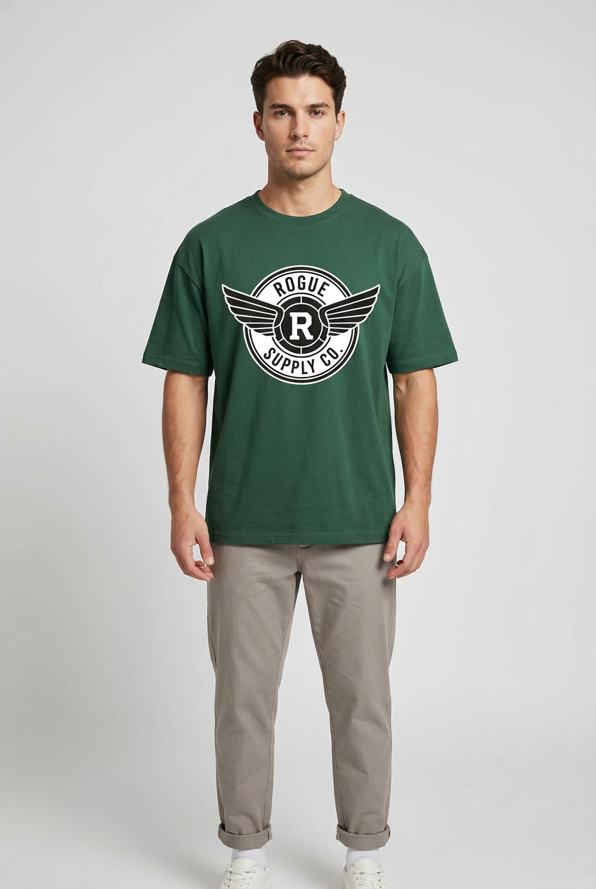 Male model wearing the forest green Rogue Supply Co. graphic T-shirt